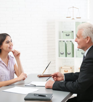 pharmacist smiling at customer at the counter